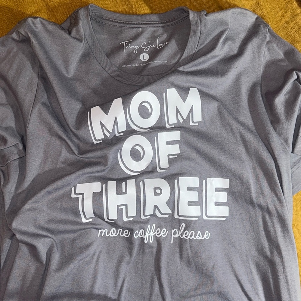 Boutique T-shirt. “Things she loves” size Lg. “MOM OF THREE more coffee please”